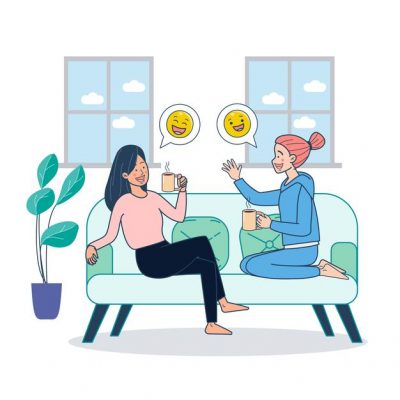 two-girls-sitting-couch-dringking-coffee-gossiping-inside-home_1150-39736